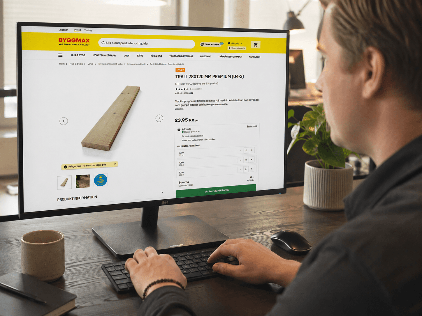 Visualisering av Byggmax produktsida på en bildskärm.
